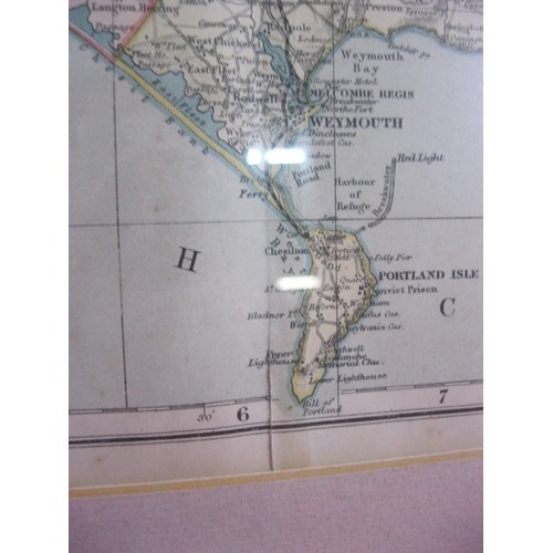 248 - A Bacon's Geographical framed and glazed map of Dorsetshire, fold to centre but in good order, c1910