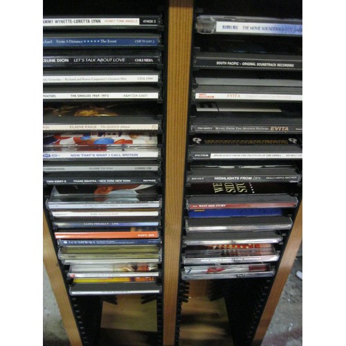 294 - 2 crates of good quality modern rock & pop CDs, a small CD rack. Includes Meatloaf, Dire Straits, Br... 