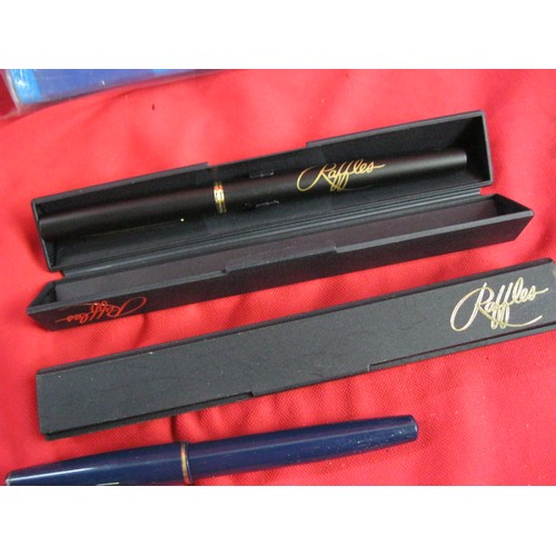 277 - A collection of vintage pens, mainly Parker, plus a boxed pen set. Includes a pair of 'Raffles' prom... 