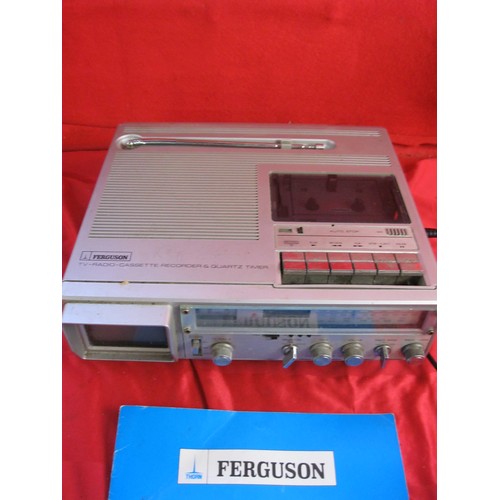 309 - A vintage Ferguson 'all-in-one' miniature TV, Radio and Cassette Player model 3T14, with instruction... 