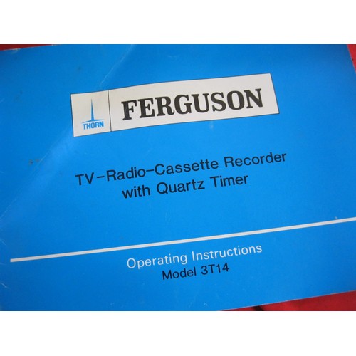 309 - A vintage Ferguson 'all-in-one' miniature TV, Radio and Cassette Player model 3T14, with instruction... 