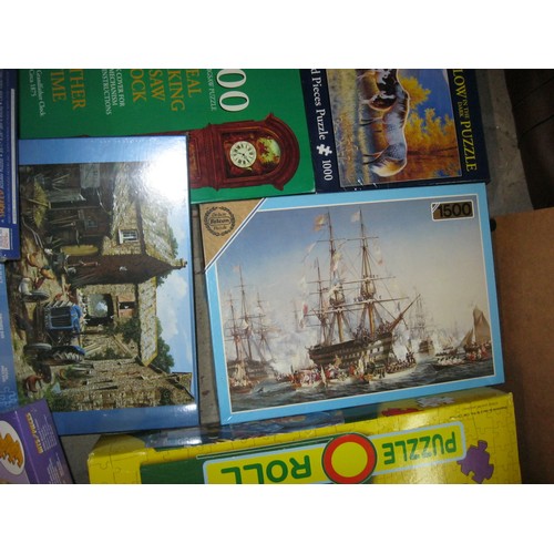 271 - A collection of jigsaw puzzles and a pair of puzzle boards