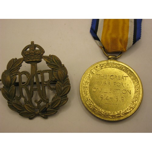 25 - WW1 Medal to RAF recipient, together with RAF Cap Badge