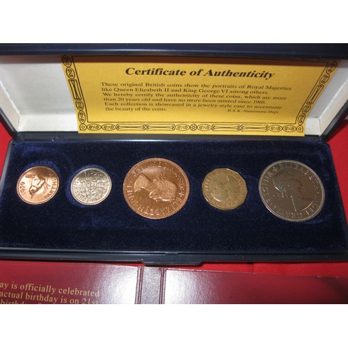 102 - A collection of Queen Elizabeth II commemorative coins in folder, plus a cased set of 5 George VI an... 