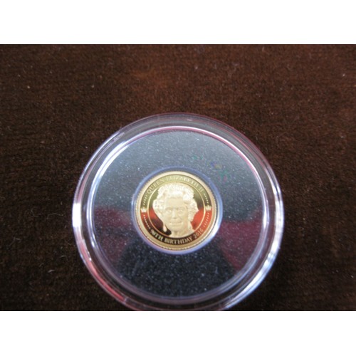 22 - A small 24 carat gold coin commemorating the 90th birthday of the late HM Queen Elizabeth II, 1000 M... 