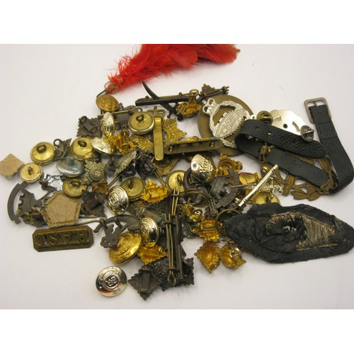 34 - A quantity of Military Badges, Buttons and Insignia
