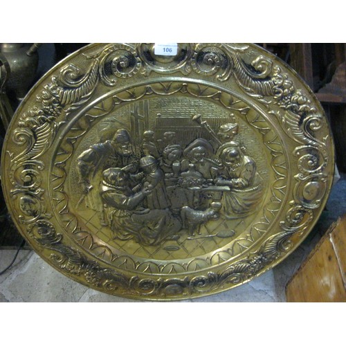 155 - Large circular brass tray or platter embossed with an Elizabethan tavern scene, diameter about 72cm