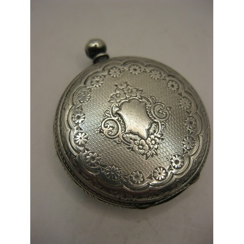 232 - A Swiss fine silver cased pocket watch, key wind and set in a foliate engraved case, patterned ename... 