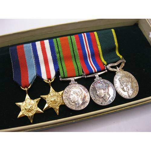 219 - A set of miniature dress medals - War Medal 1939-1945, Defence Medal, 1939-45 Star, The Air Crew Eur... 