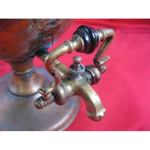 204 - Antique copper and brass Samovar or hot water urn. Height 35cm. The tap is fused, some verdigris, ot... 