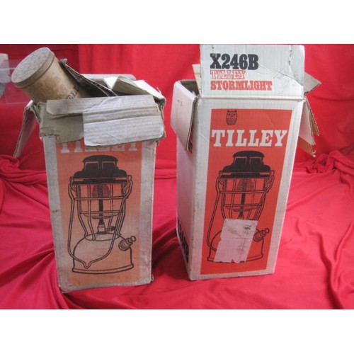 61 - Two boxed Tilley storm lights E246B