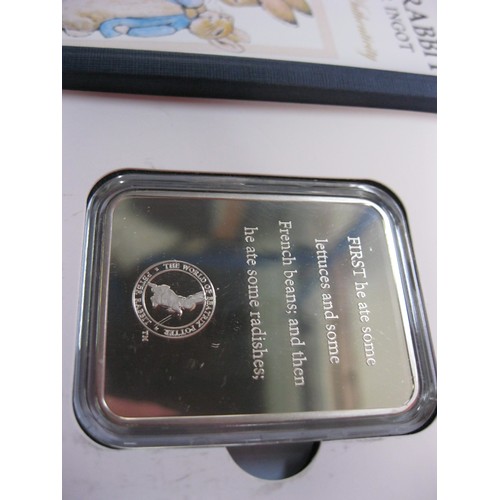 23 - A 1 ounce silver ingot commemorating Peter Rabbit by Beatrix Potter, in book-style presentation case... 