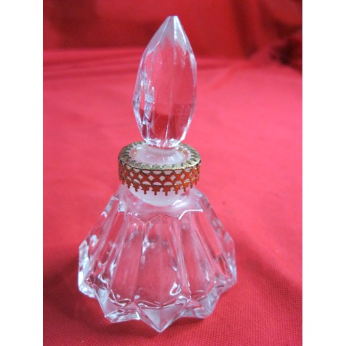 17 - A pair of pink glass dressing table bottles with spherical stoppers (height 20cm, good condition but... 