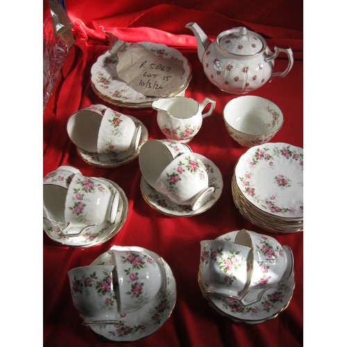 15 - Aynsley Grotto Rose part teaware - 10 tea cups and saucers,  a milk jug, 9 side plates (one is crack... 
