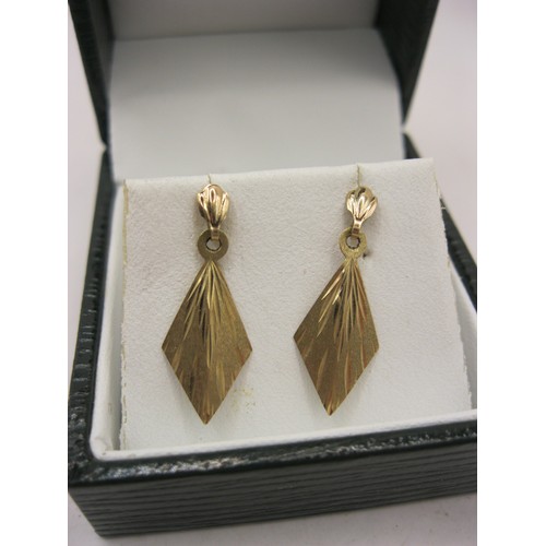 146 - A pair of 9 carat gold diamond-shaped Gold Earrings