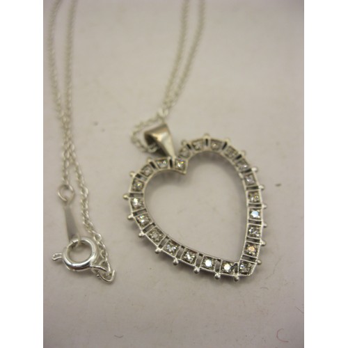 147 - 18ct white gold heart-shaped diamond pendant