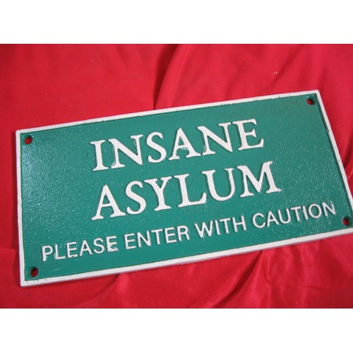 372 - A cast iron Insane Asylum sign