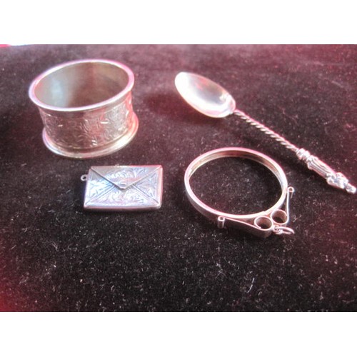 170 - A small assortment of silver items including a napkin ring hallmarked for Chester 1904, a small enve... 