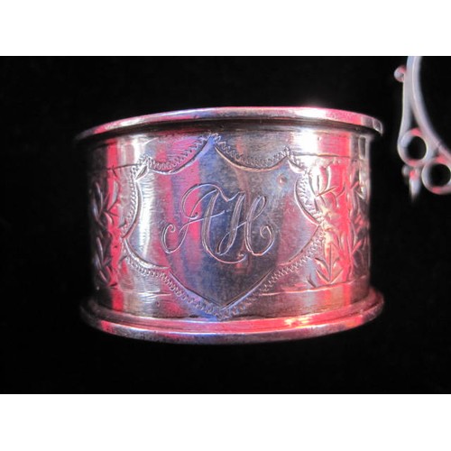 170 - A small assortment of silver items including a napkin ring hallmarked for Chester 1904, a small enve... 