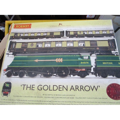 6 - Hornby Golden arrow set in original box along with a set of three coaches to run in the rake.