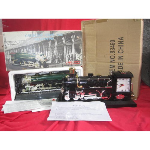 120 - Two model train related novelties - a Telemania 'Crescent Train 1925' telephone in original packagin... 