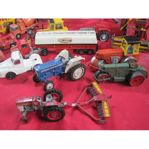 141 - About 16 die cast agricultural and works model vehicles including combine harvester, fork lift truck... 