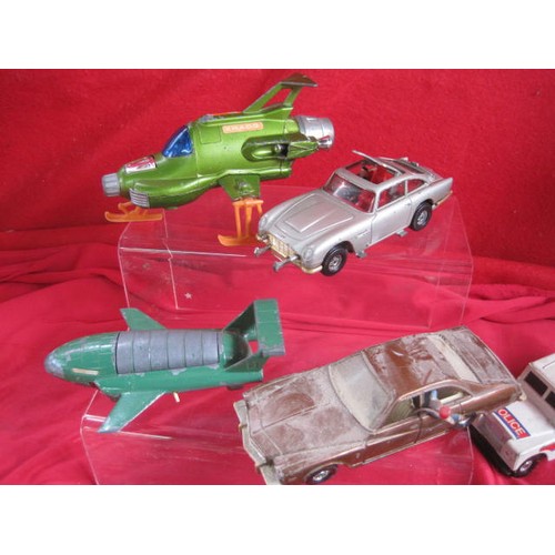 146 - An assortment of 12 play worn and inomplete die cast cars and vehicles including Corgi 007 Aston Mar... 