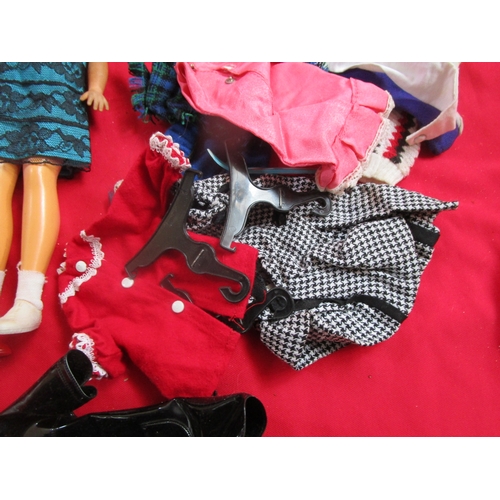 148 - Sindy Doll with a whole host of clothing and accessories to include Boots, Hand bag, Skis(one broken... 