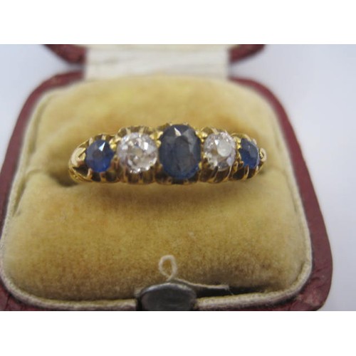 15 - An 18ct Diamond and Sapphire ring of good quality size 
weight 4 grams