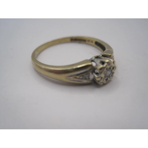 36 - A 9 carat gold diamond solitaire ring, the diamond of .10 carat, ring size R, approx weight 2.39g