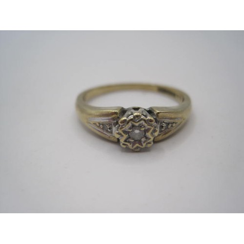 36 - A 9 carat gold diamond solitaire ring, the diamond of .10 carat, ring size R, approx weight 2.39g