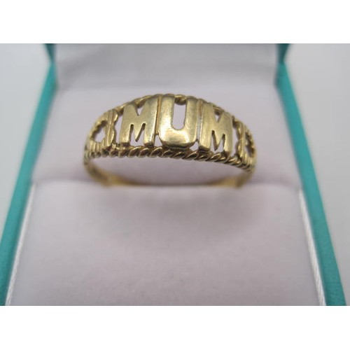 41 - A 9 carat gold ring, slightly mishapen to one side, the front bearing the word 'Mum' flanked by hear... 