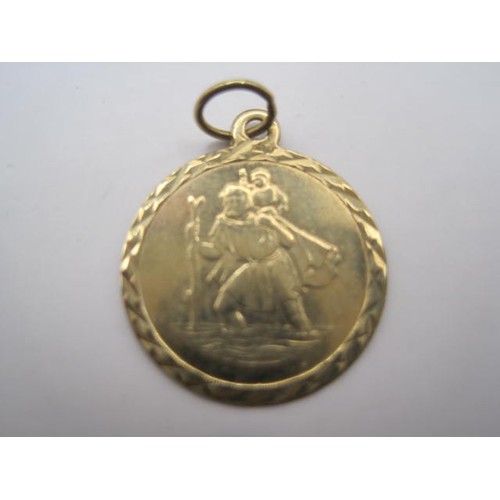 53 - A small gold St Christopher, inscribed with verse to rear, a pair of stud earrings set with possible... 