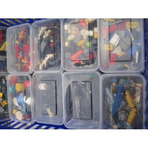 206 - Various Lego bricks and components, wheels and spindles. Contained in 28 tubs in a large blue plasti... 