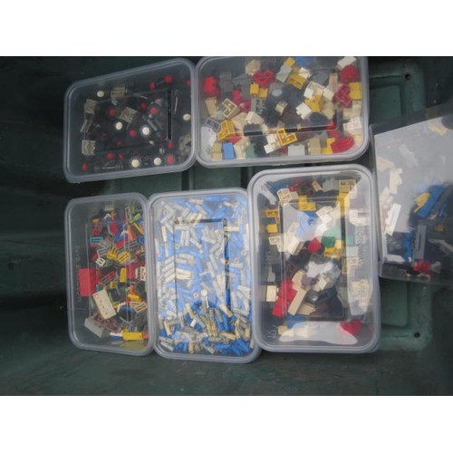 208 - Assorted Lego bricks and components contained in 21 tubs in a green plastic crate.