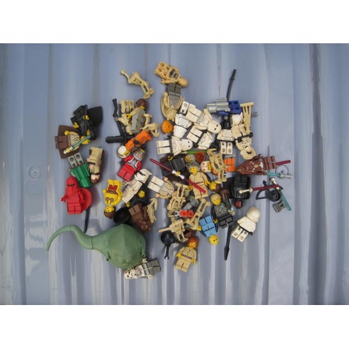 212 - Assorted Lego blocks, components and Star Wars figures with various other parts and five battery-ope... 