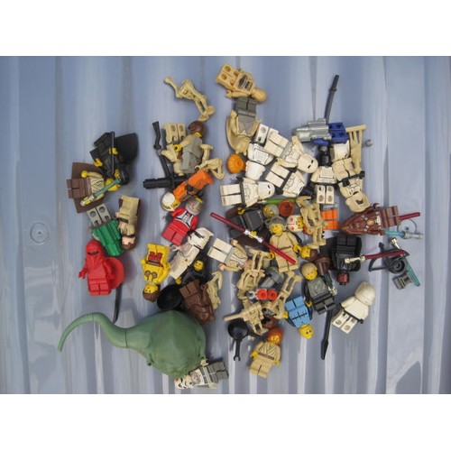 212 - Assorted Lego blocks, components and Star Wars figures with various other parts and five battery-ope... 