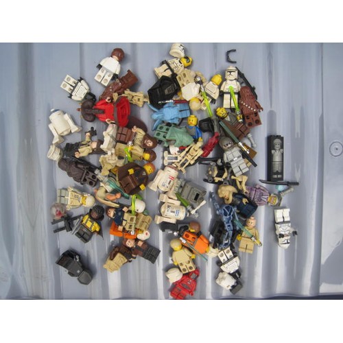 212 - Assorted Lego blocks, components and Star Wars figures with various other parts and five battery-ope... 