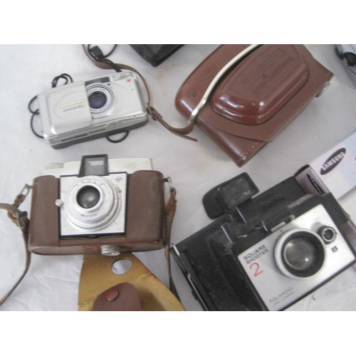 110 - A selection of vintage and newer cameras