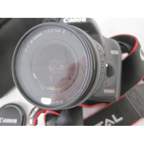 130 - Canon Eos 1000D DSLR camera with Canon zoom lens EF-S 18-55mm 1:3.5 - 5.6, camera serial no 41506130... 