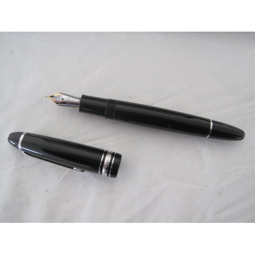 128 - Montblanc fountain pen and pencil - a Montblanc  Meisterstuck Pix black fountain pen serial no PZ210... 