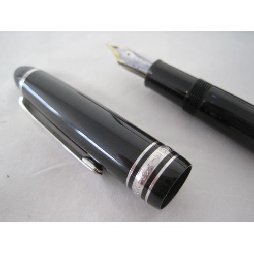 128 - Montblanc fountain pen and pencil - a Montblanc  Meisterstuck Pix black fountain pen serial no PZ210... 