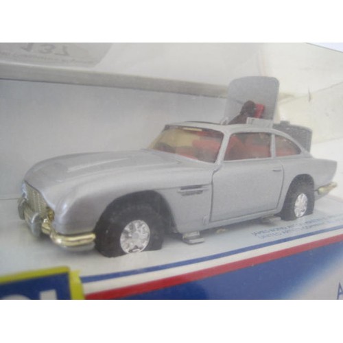 137 - Corgi James Bond Aston Martin 94060 in original box. The vehicle has apparently never been removed f... 