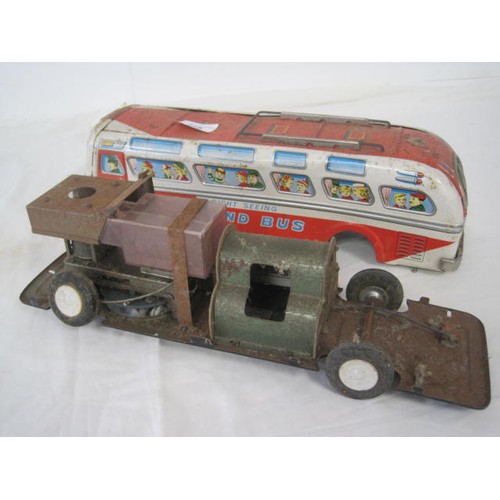 218 - A vintage Modern Toys Japanese made 1960s tin plate Sound Bus, rather battered but intact, battery p... 