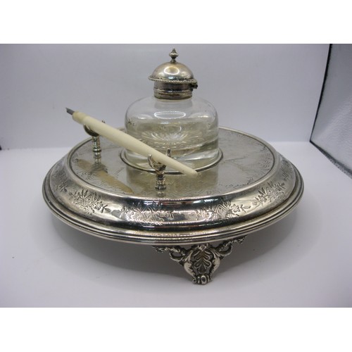 61 - A Silver Plated Desk Inkwell with glass well and bone/bakelite dip and pen, c. late 1900's