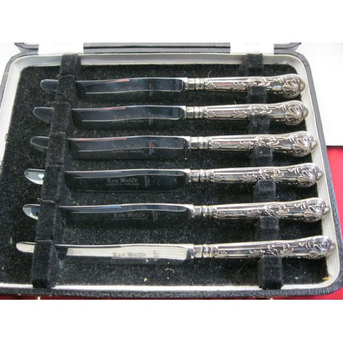 65 - A set of six silver handles Dessert Knives and Forks in two fitted cases, hallmarked Sheffield 1970 ... 