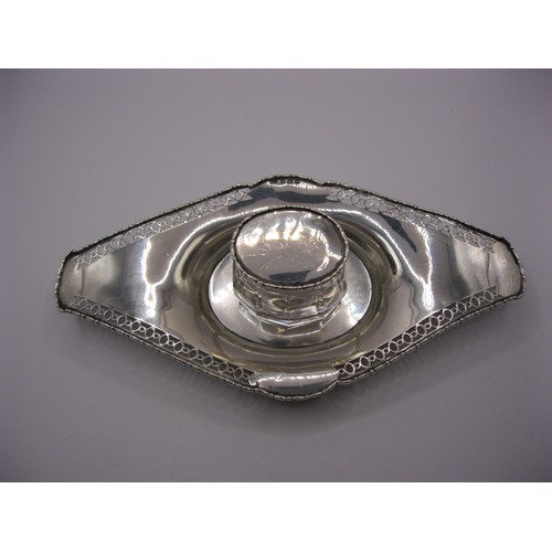 75 - A solid silver Desk Inkwell set on four glass feet, with glass & silver lidded pot, hallmarked Birmi... 