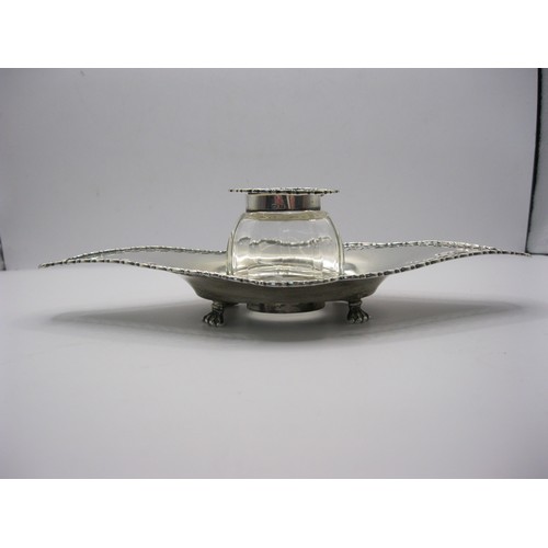 75 - A solid silver Desk Inkwell set on four glass feet, with glass & silver lidded pot, hallmarked Birmi... 