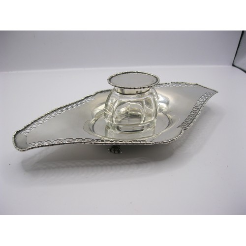 75 - A solid silver Desk Inkwell set on four glass feet, with glass & silver lidded pot, hallmarked Birmi... 