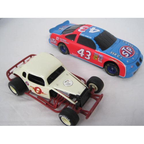 246 - 1.24 scale STP stock car along with a Modified Legions 1.25 scale Nutmeg collectables sand buggy .